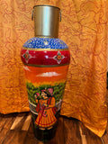 Elongated metal vase with traditional rajasthani painting all over