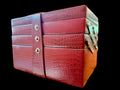 Red textured jewelry box on a patterned surface