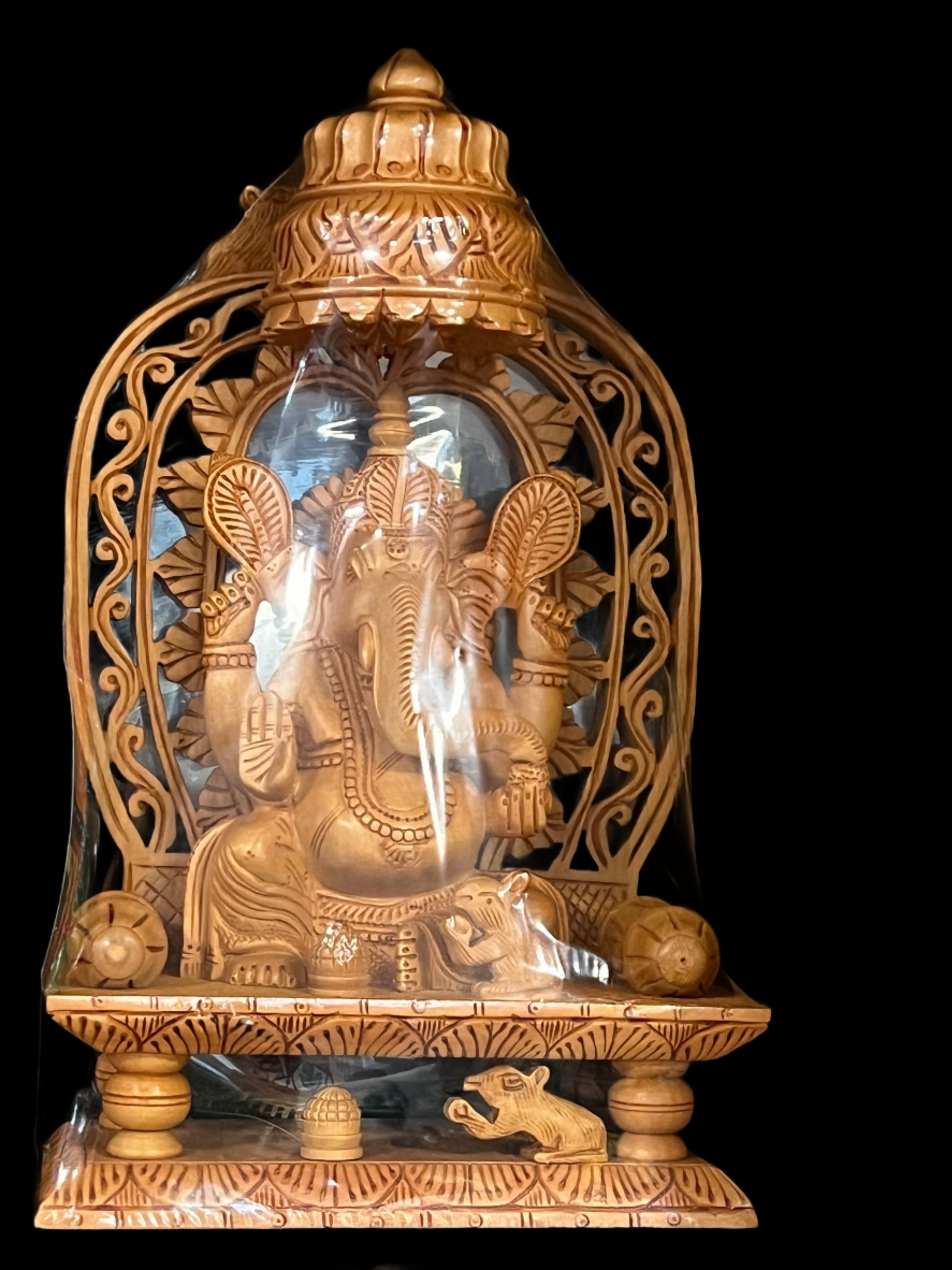 Ganeshji with umbrella , wood art