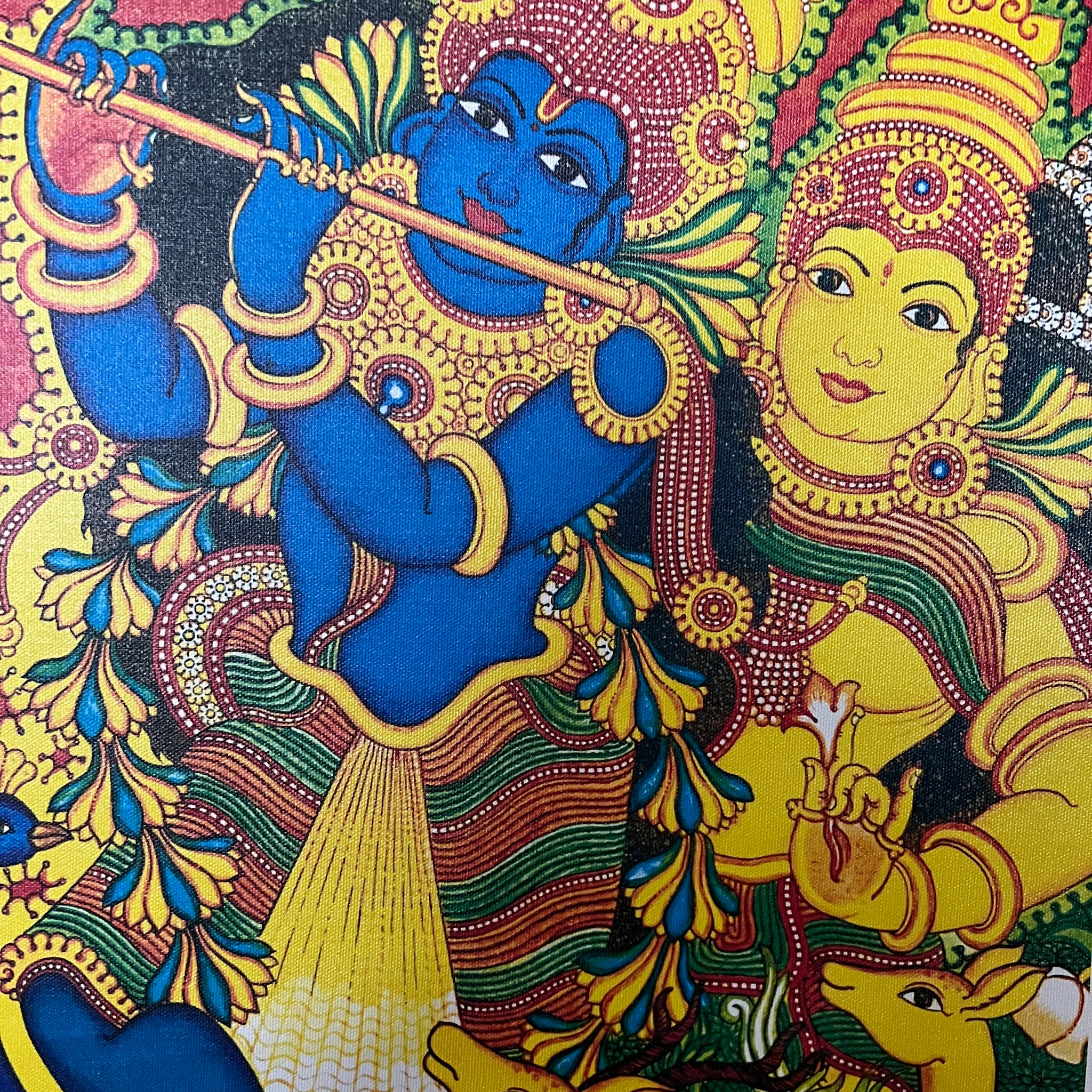 This Kerala Mural painting digital print on canvas from Saanskrityam Handicraft Store features a vivid and intricate depiction of a blue-skinned deity playing a flute, embellished with elaborate jewelry and attire. Alongside stands another figure holding a pot, while two deer at the bottom together create a tranquil Radha and Krishna scene amidst rich decorative patterns.