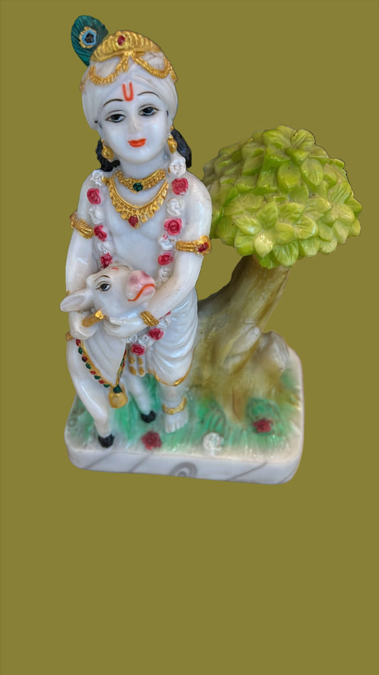 Marble Krishna with his cow